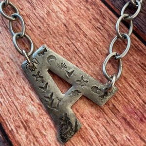 Handmade art initial necklace. “A”